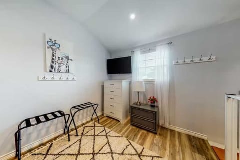 Hooks, a dresser, and luggage racks will help you to keep organized in the loft, without having to live out of your suitcases!