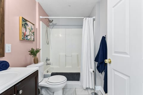 Combined shower/tub, hair dryer, towels, soap