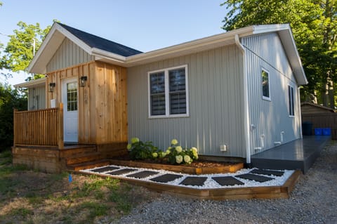 Outside of the Wavecrest. Side and back deck are composite. Tandem driveway.
