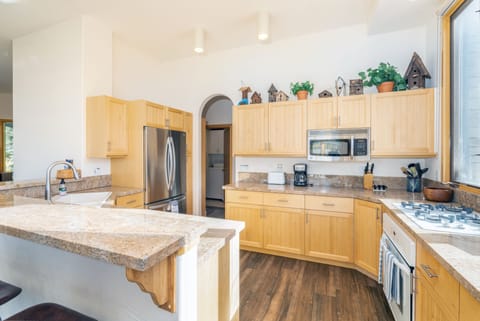 Bright, open kitchen, well-appointed with tons of storage