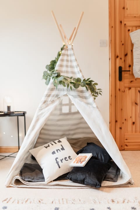 Kids will love playing in the upstairs bedroom