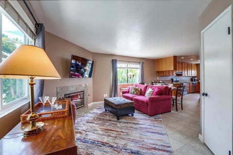 Open living space with room for friends and family to dine, relax by the fire and watch sports or movies!