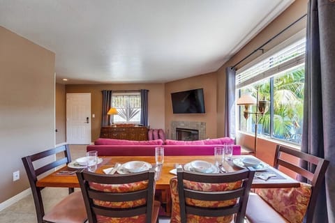 Dining table for 4 can be extended to seat 6 with additional 2 chairs from storage closet.