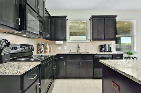 The kitchen is so roomy and bright and is fully equipped with everything you need for cooking and baking!