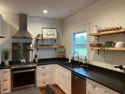 Fully stocked kitchen w/gas stove.