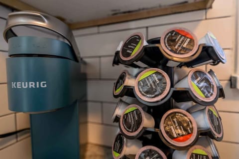 Fuel your day with our complimentary coffee pods—fresh brew at your fingertips whenever you need a pick-me-up!