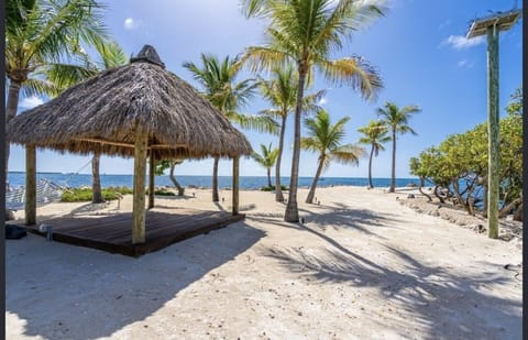 On the beach, sun loungers, beach towels