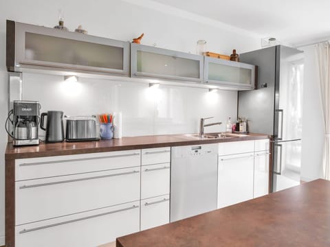 Cabinetry, Countertop, Kitchen Appliance, Kitchen, Kitchen Stove, Home Appliance, Sink, Interior Design, Wood, Major Appliance