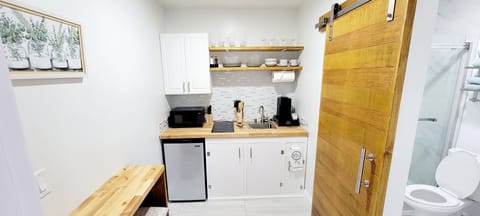 Fridge, microwave, stovetop, coffee/tea maker