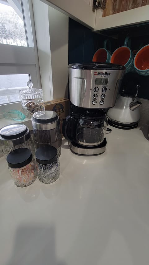 Coffee pot and starter grounds provided