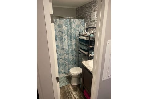 Combined shower/tub, hair dryer, towels, soap