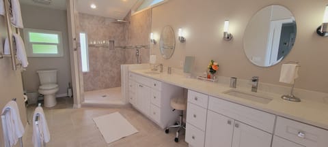 Combined shower/tub, hair dryer, towels, soap