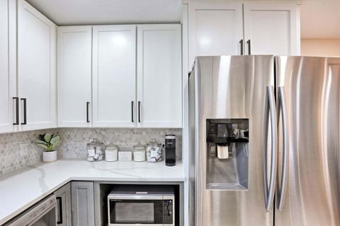 Brand new microwave and stainless steel fridge