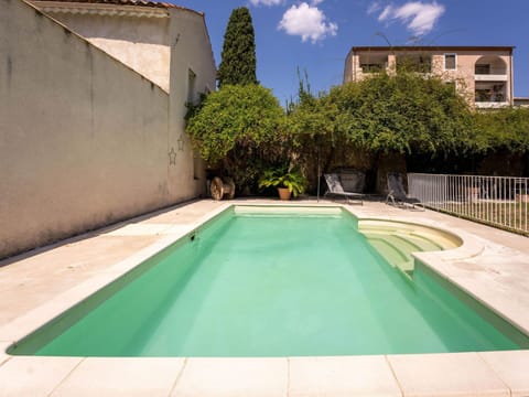 Sky, Daytime, Cloud, Plant, Property, Water, Building, Green, Azure, Swimming Pool
