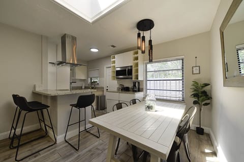 Unit 3. Living and dining area. Unit is 2 bedrooms and 2 bathrooms.