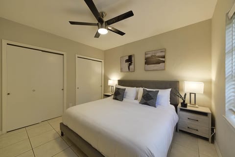 Unit 4. Bedroom 2 with king bed. Unit is 3 bedrooms and 2 bathrooms. 