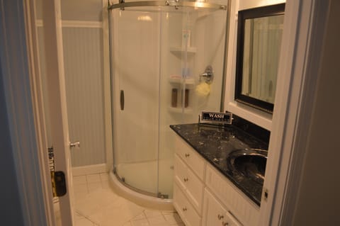 Combined shower/tub, hair dryer, towels, soap