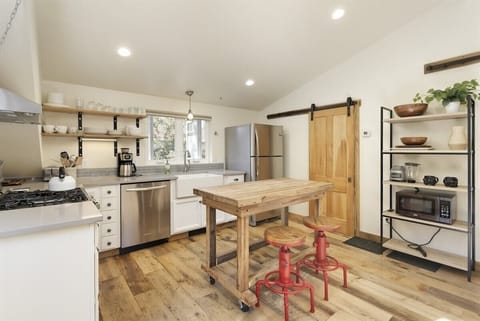 Spacious kitchen with antique sliding doors to your bathroom and master bedroom