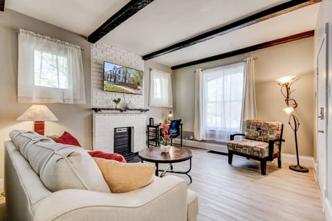 Welcome to your comfy Capitol Hill retreat, complete with Mediterranean decor