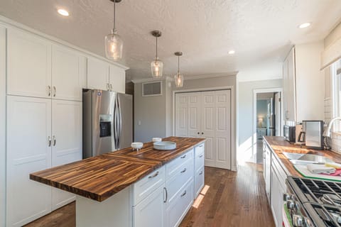 Whip up your favorite recipes in this sleek and functional kitchen.