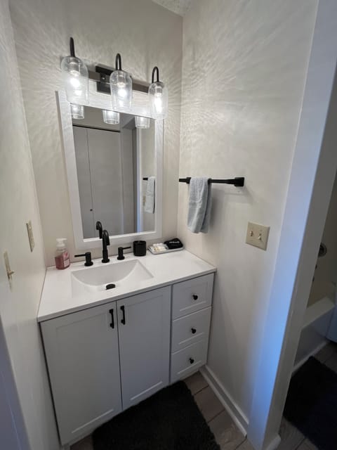 Combined shower/tub, hair dryer, towels, soap