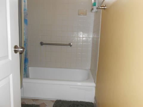 Combined shower/tub, hair dryer, towels, soap