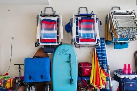 Lots of beach chairs, umbrellas, and beach toys! Wagon as well to haul it down!