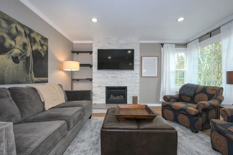Main Floor Living Room. Relax and recharge with a warm fire, tv show, or music.