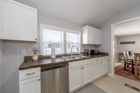 The fully equipped kitchen comes with stainless steel appliances and everything you could need to make delicious meals