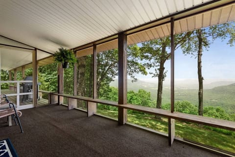 Screened in porch along the backside of the house. Amazing views!