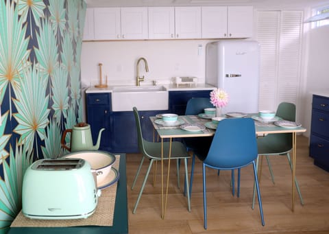 Kitchen/dining area has a retro feel dating back to the era the house was built.
