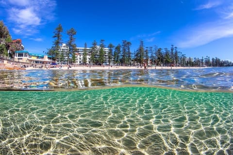 On the beach, sun loungers, beach towels