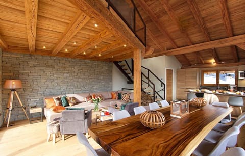 Take a seat at the wooden dining table.