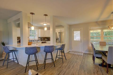 Four bar style seats at the kitchen.