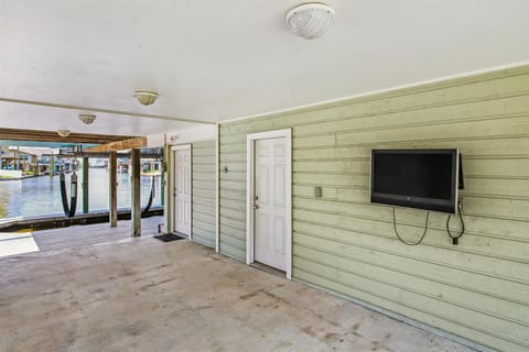 Large Patio - Our spacious patio is the perfect place to gather the family and enjoy the beautiful yard. The salt-laced breezes are definitely a plus!