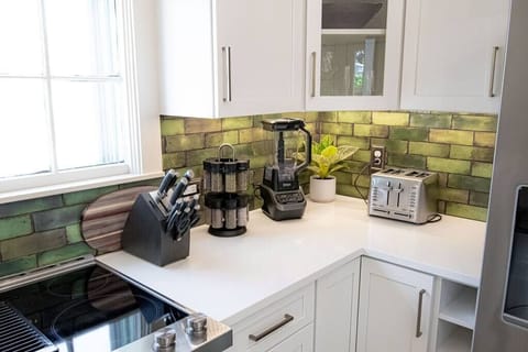 The kitchen is fully equipped with all the tools to create a meal at