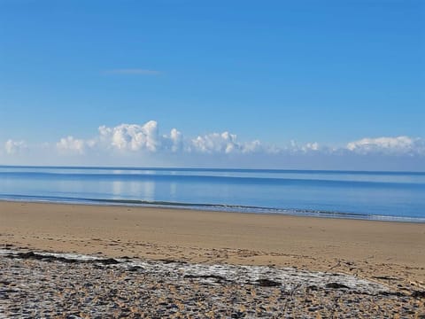 Beach nearby, sun loungers