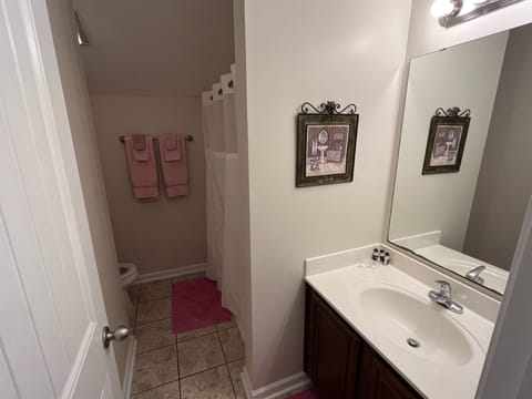 Combined shower/tub, hair dryer, towels, soap