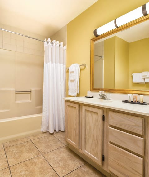 Combined shower/tub, hair dryer, towels, soap