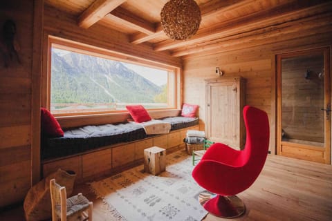 First floor lounge with TV and games. Access to the large balcony