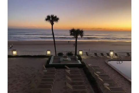 On the beach, sun loungers, beach towels