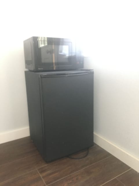 Mini fridge & microwave. Complimentary water bottles in fridge for you!