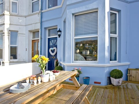 Decked patio with garden furniture and barbecue | Kerensa, Looe