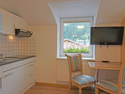 Cabinetry, Furniture, Window, Kitchen, Chair, Building, Wood, Lighting, Architecture, Countertop