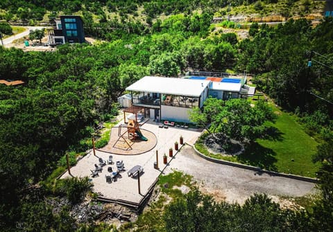 Welcome to the Deer & Dog Haus – Canyon Lake’s only vacation rental with a private pickleball court! Nestled in the Texas Hill Country, this one-of-a-kind retreat is designed for unforgettable