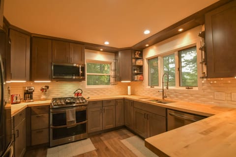 Open Kitchen with butcher block counter tops.