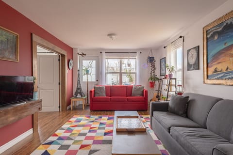 Living area | TV, fireplace, books