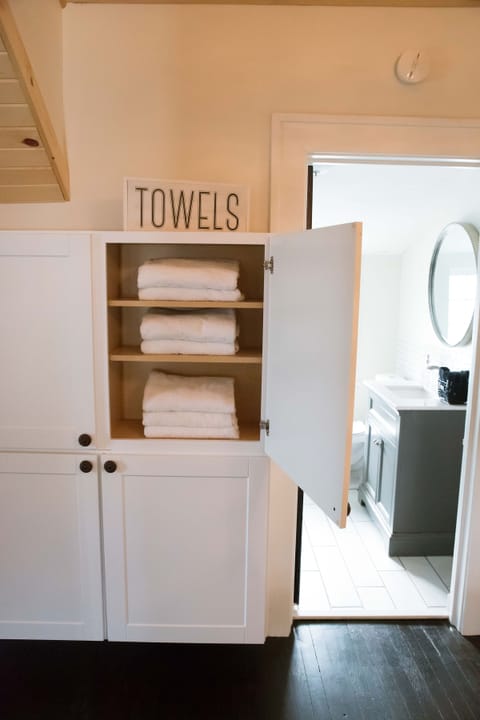 Towel Storage with plenty of towels. 