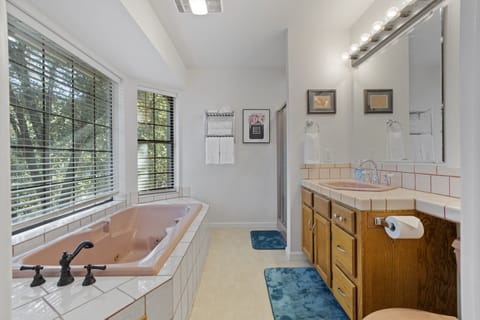 Combined shower/tub, hair dryer, towels, soap