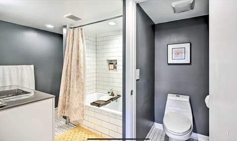 Combined shower/tub, hair dryer, towels, soap